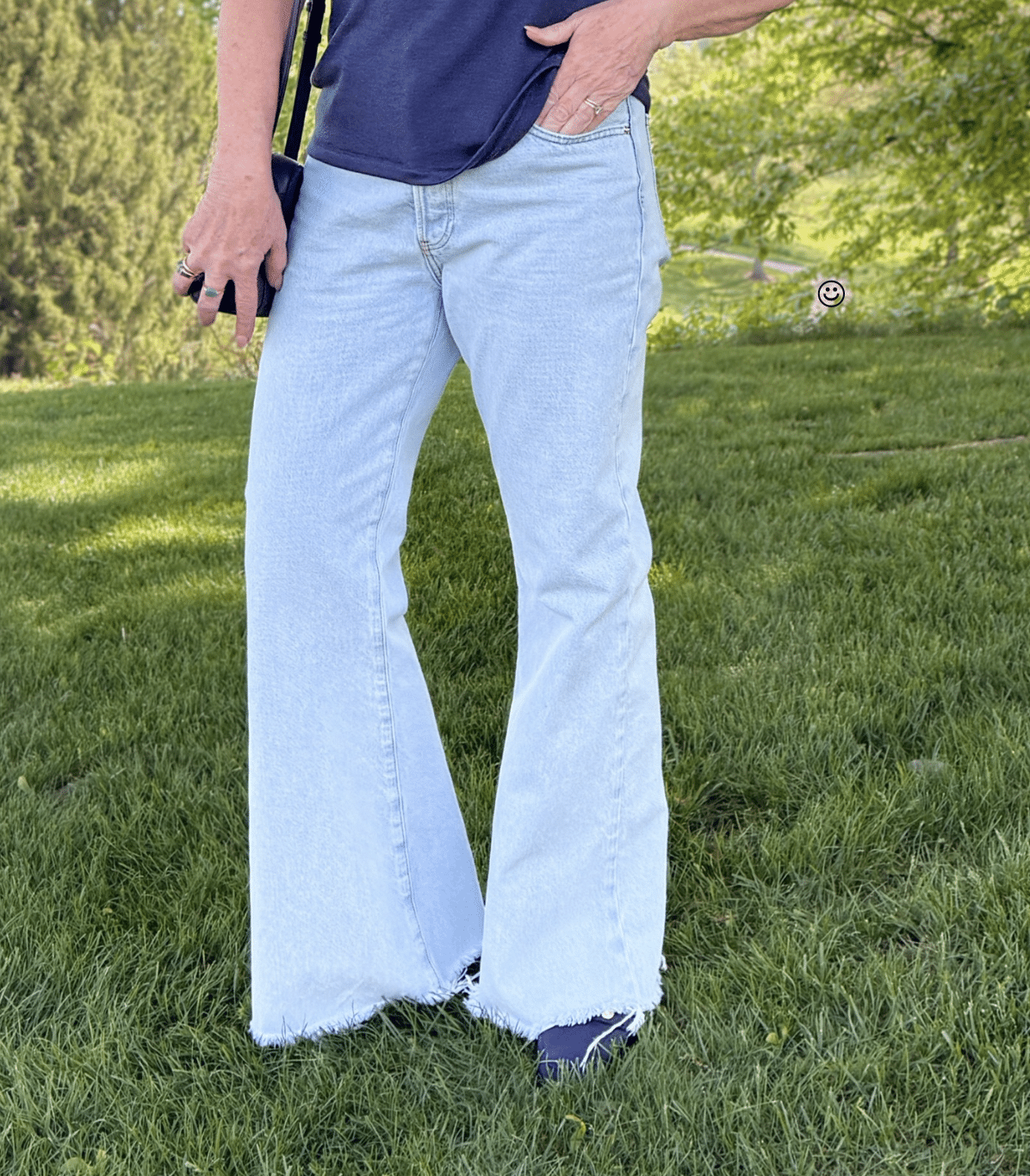 Tania Stephens wearing light wash jeans for summer 